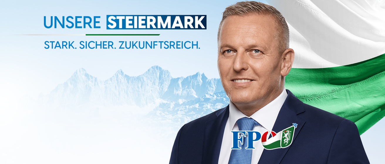Ein lächelnder Mann in formeller Kleidung steht vor einem Hintergrund von Bergen. Unter einem Logo steht der Text 'SERE STEIERMARK. K. SICHER. ZUKUNFTSREIC.' Die Buchstaben 'FP' befinden sich in der unteren rechten Ecke.