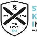 Logo für Steuer Komm Immobilien 2014, mit einem Schild mit schwarzem X und weißer Kontur, auf schwarzem Hintergrund.