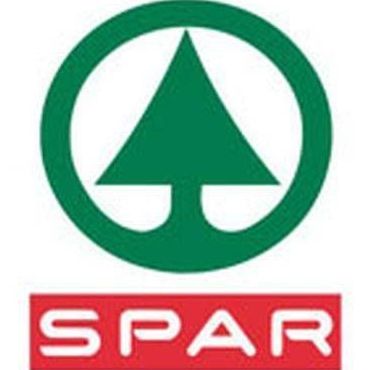 Das Logo von SPAR, das einen grünen Baum in einem grünen Kreis mit einem roten Rechteck darunter zeigt.