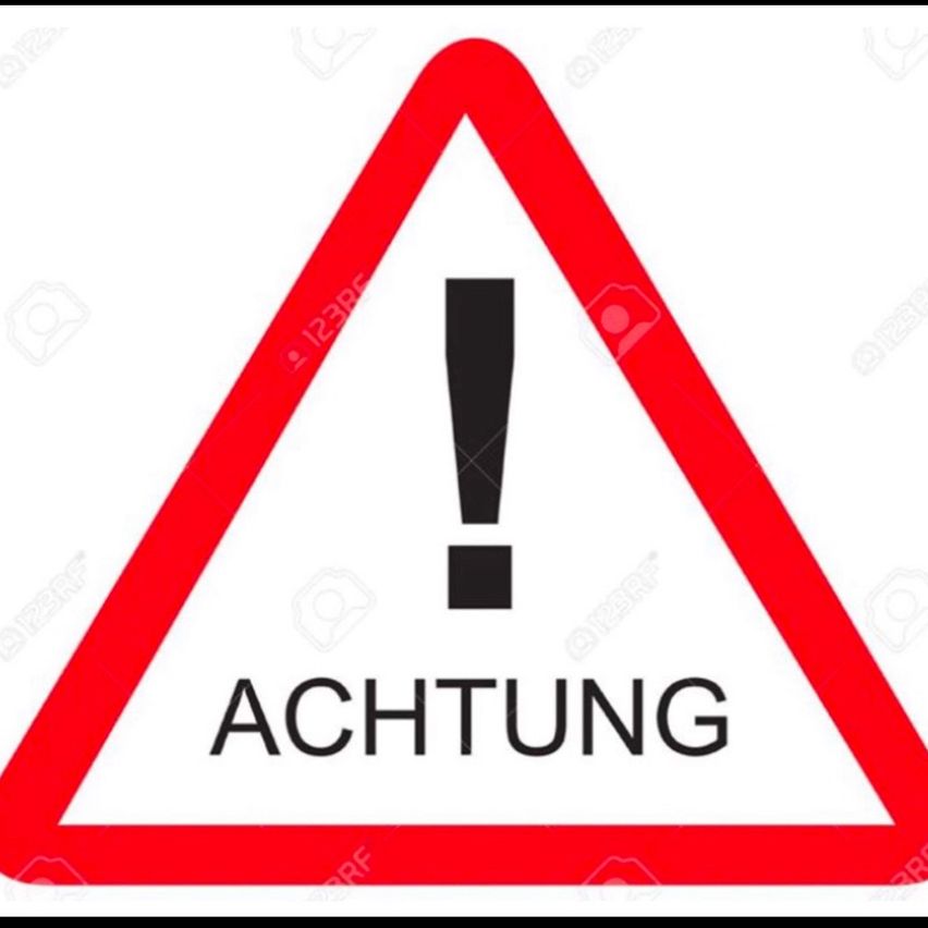 Ein rotes Dreiecksschild mit weißem Rand und schwarzem Ausrufezeichen. Das Wort 'Achtung' ist in Schwarz im Dreieck geschrieben.