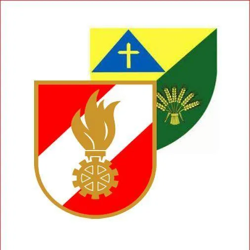 Ein Wappen mit Flammen- und Zahnradsymbol, rot-weißem Hintergrund, mit einem blau-gelben Dreieck mit einem Kreuz in der oberen rechten Ecke.
