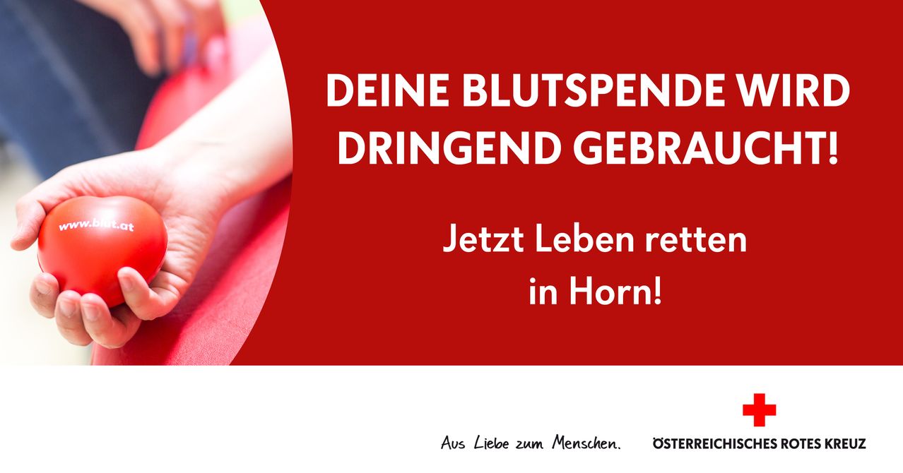 A red poster with white text reading 'Your blood donation is urgently needed. Save lives now in Horn!' with a hand on a red cloth.