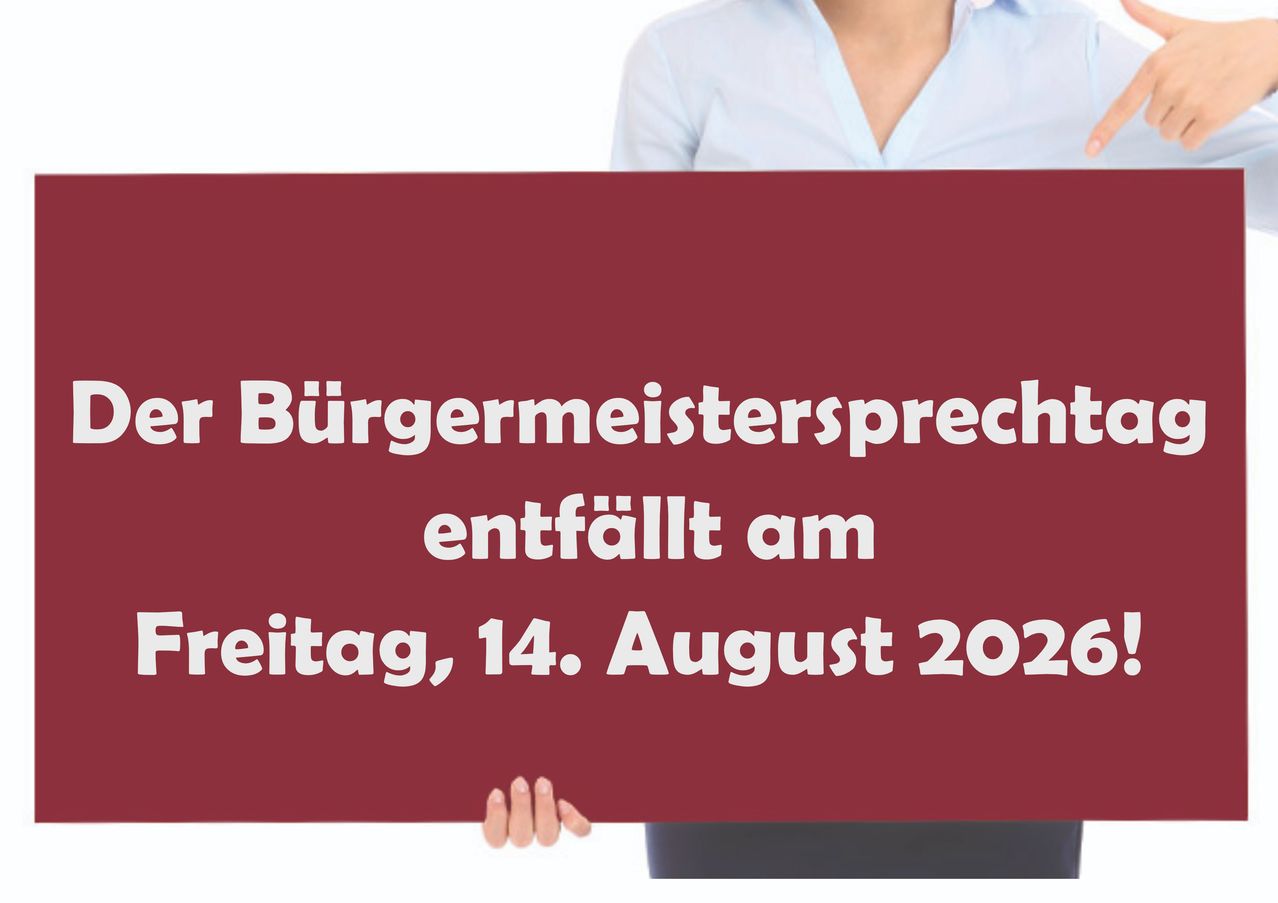 A person holds a sign that reads 'The mayor's speech takes place on Friday, August 14, 2020.' The sign is maroon with white text.