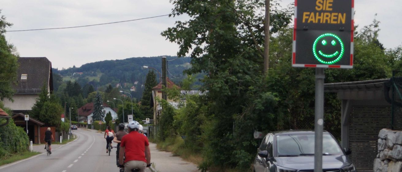 Person, Helmet, Road, Car, Bicycle, Shoe, Path, Computer Hardware, Monitor, City