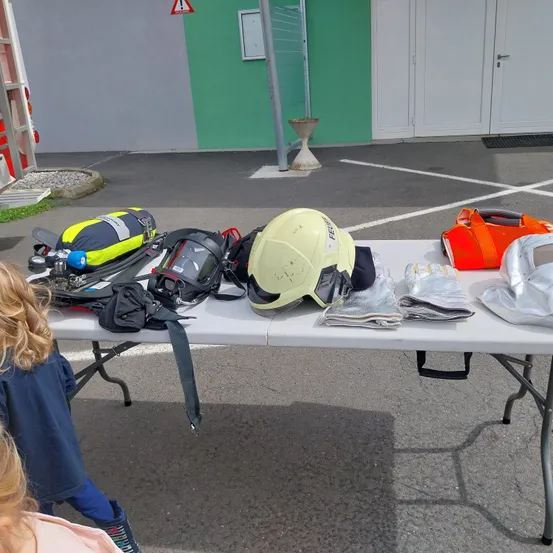 Helmet, Hardhat, Child, Female, Girl, Person, First Aid, Face, Shoe, Stretcher