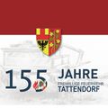 Das Wappen von Tattendorf mit einem rot-gelben Schild, der einen schwarzen Adler zeigt, vor einem weiß-roten Hintergrund und dem Text 155 Jahre Freiwillige Feuerwehr Tattendorf.