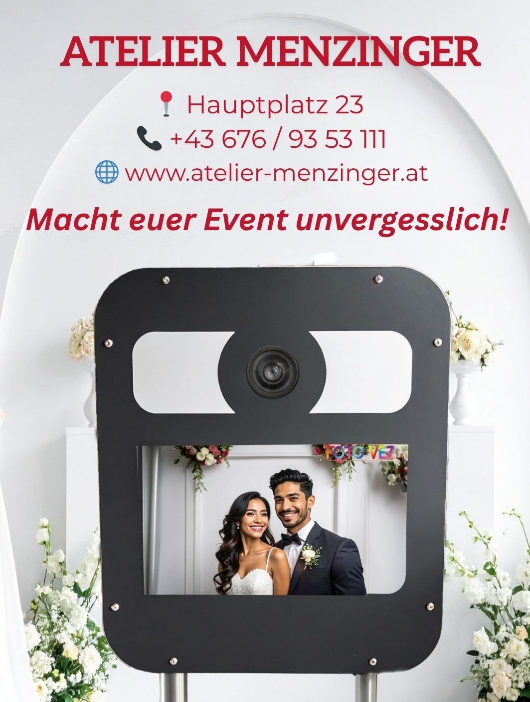 A booth with a smiling bride and groom inside, with a website address and phone number above.