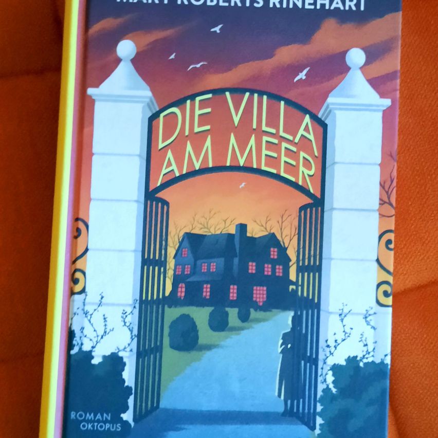 Ein Buch mit dem Titel Die Villa am Meer, mit einem Haus und einer Person davor.