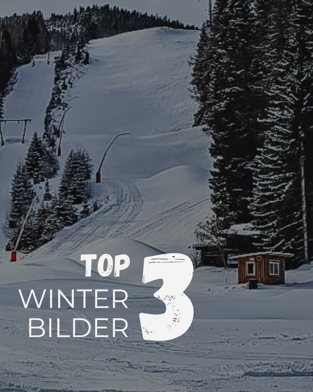 Snowy mountain slope with trees and a ski lift in the background. A ski track is visible, and a number 3 is prominently displayed in the foreground.