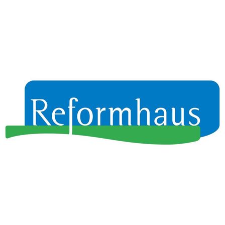 Das Reformhaus-Logo zeigt eine blau-grüne rechteckige Form mit dem Text 'Reformhaus' in Weiß auf weißem Hintergrund.