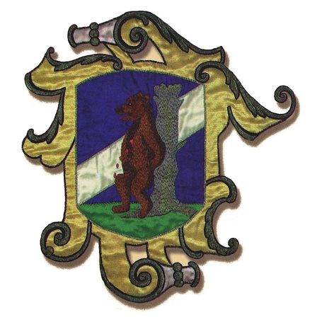 Bild enthält, Logo, Badge, Symbol, Emblem, Animal, Elephant, Mammal, Wildlife, Text