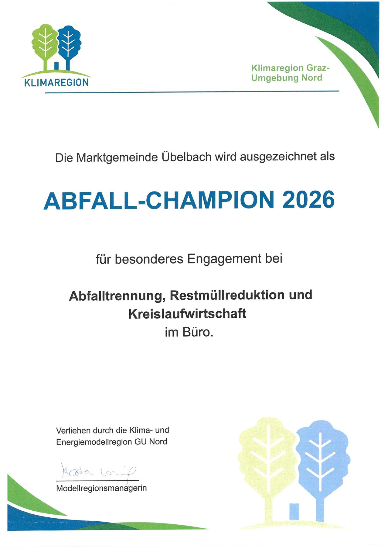 A certificate awarding Ubelbach as Waste Champion 2026 for special engagement in waste separation, waste reduction, and circular economy in the office. Issued by Klima- und Energiemodellregion GU Nord.