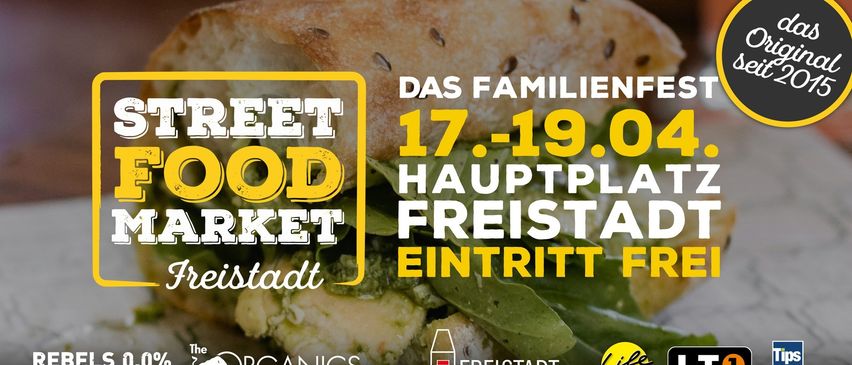 Werbeplakat für den Familien Street Food Markt in Freistadt vom 17. bis 19. April. Der Sandwich im Vordergrund ist mit grünem Gemüse gefüllt.