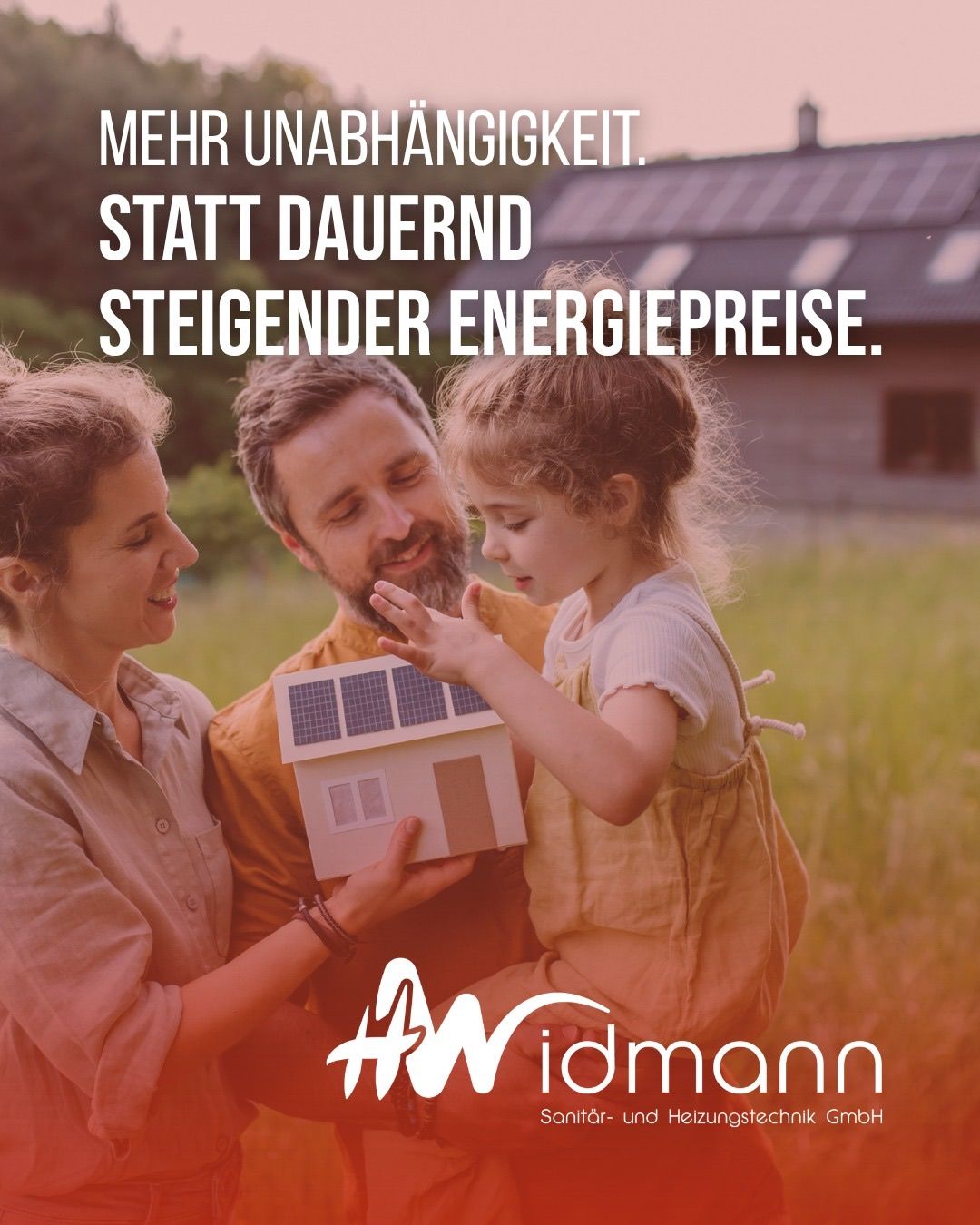 A family stands in a field with a house model in hand, solar panels on the roof. The image conveys independence from rising energy prices.