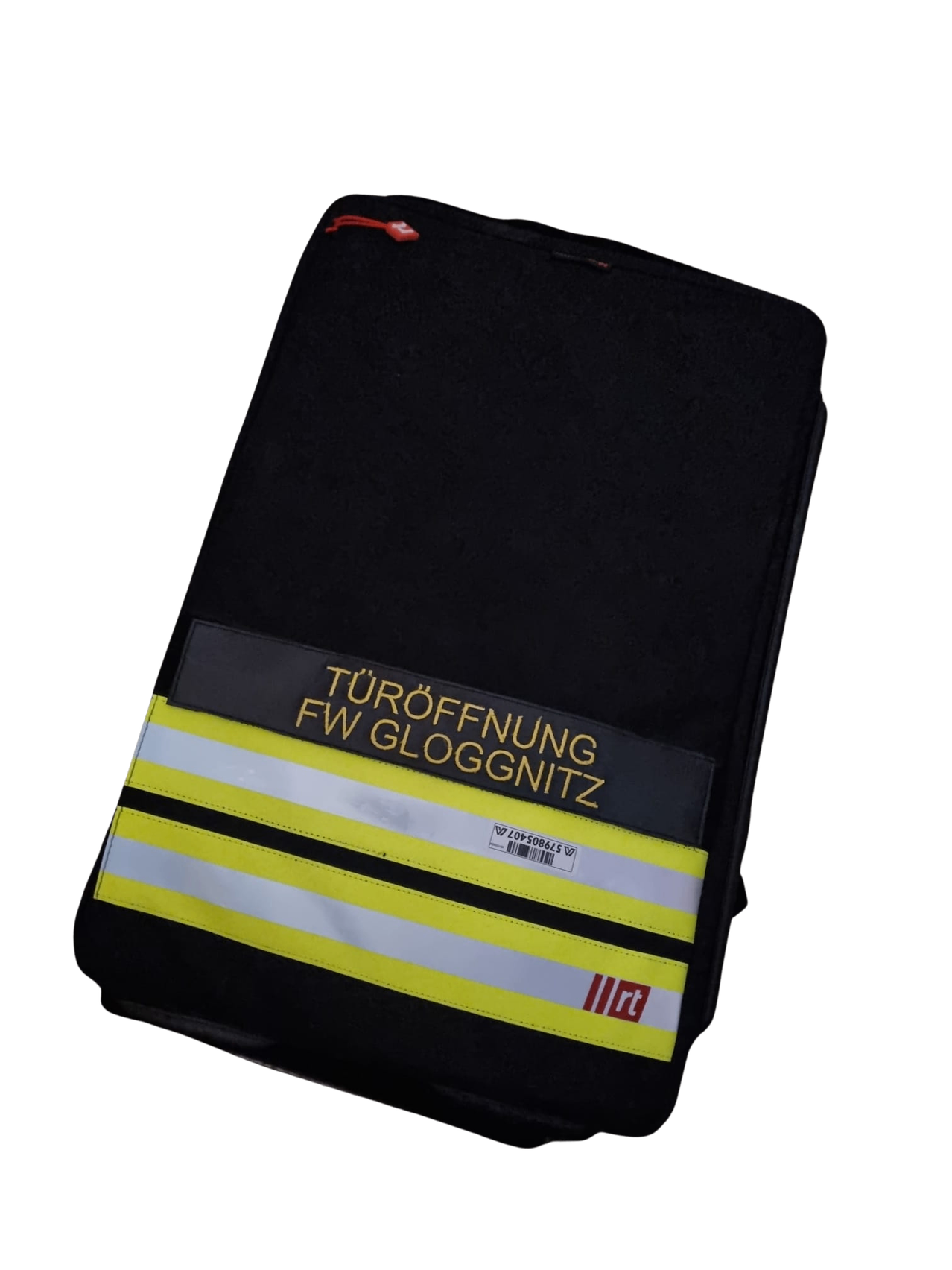 A black bag with yellow and white reflective strips. The text 'TUROFFNUNG FW GLOGGNITZ' is written in yellow. A small red tag is attached to the top left corner.