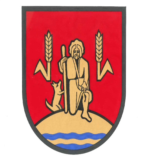 Ein Wappen zeigt eine sitzende Figur mit einem Stab und einem Hund, flankiert von Weizenähren, auf einem Land- und Wasserdesign.