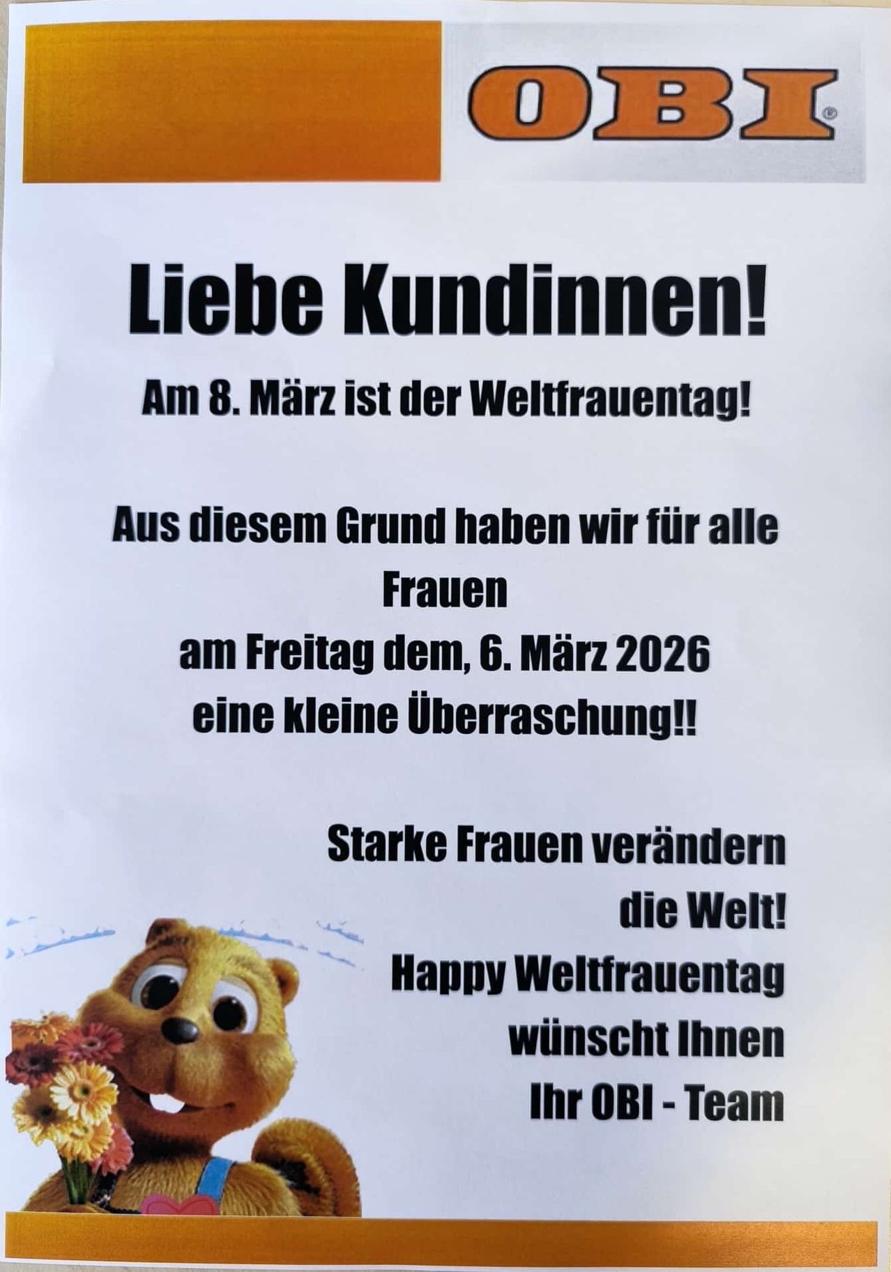 Poster in German for International Women's Day on March 8, 2026. It announces a surprise for all women on Friday, March 6, 2026. The poster features a bear holding flowers.