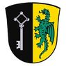 Ein Schild in zwei Bereiche geteilt; linker Bereich zeigt einen Schlüssel, rechter Bereich zeigt einen grünen Drachen auf gelbem Hintergrund.