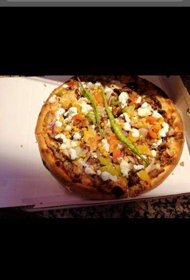 Bild enthält, Food, Pizza, Advertisement