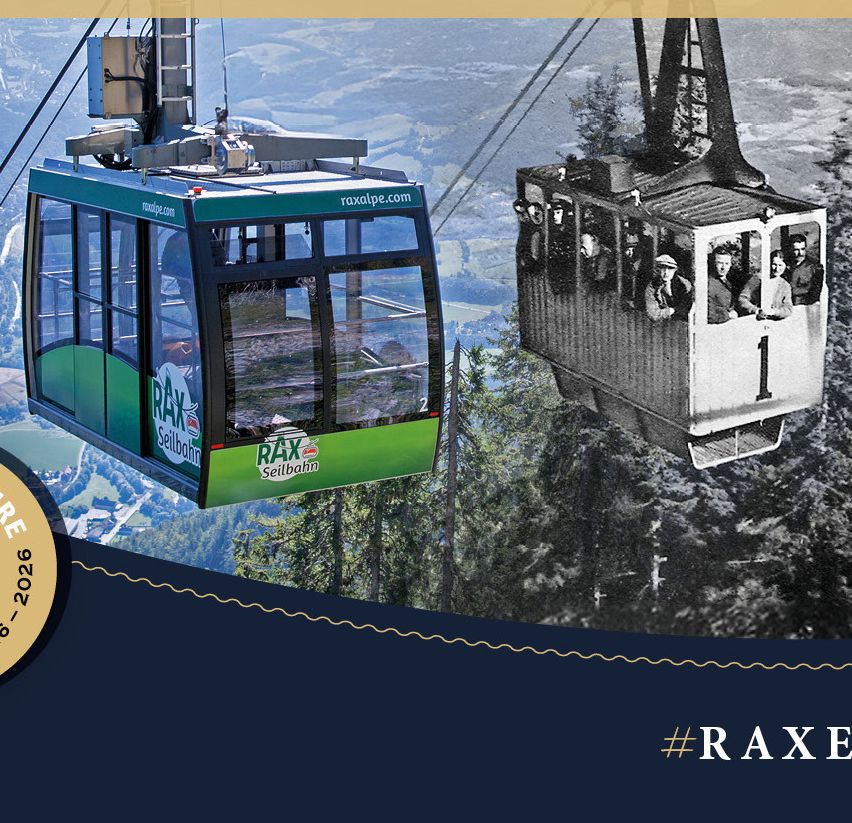 A cable car with the text '100 years' in the center, showing a modern green cable car and a vintage cable car with passengers. The background shows a mountainous landscape.