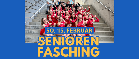 Eine Gruppe von Tänzerinnen in roten Kostümen posiert auf einer Treppe für ein Foto mit dem Datum 15. Februar in Gelb auf einem blauen Hintergrund geschrieben.