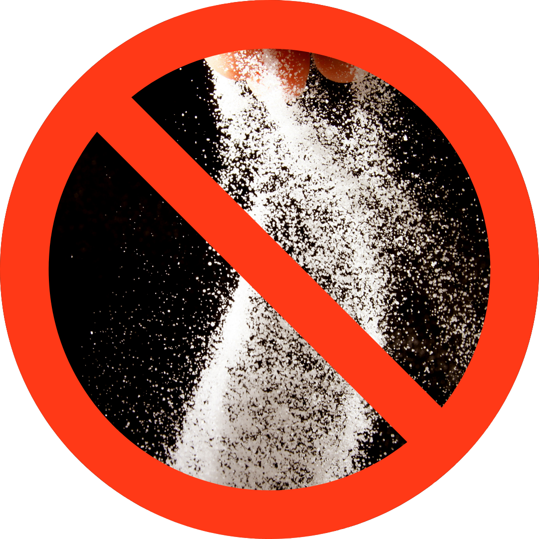 Ein rotes Verbotsschild mit einem Kreuz durch einen Haufen Zucker.