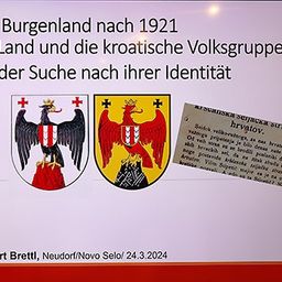 Präsentationsfolie von Dr. Herbert Brettl über die Region Burgenland nach 1921, mit Fokus auf die Identitätssuche der kroatischen Volksgruppe, mit Wappensymbolen und einem Auszug aus einem historischen Dokument.