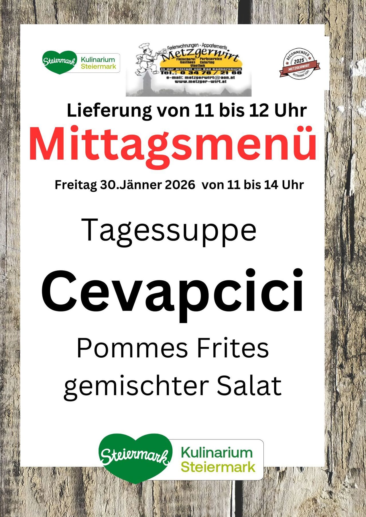 Ein Plakat bewirbt ein Mittagsmenü für den 30. Jänner 2026 von 11 bis 14 Uhr. Es beinhaltet 'Cevapcici' als Tagessuppe, begleitet von Pommes Frites und gemischtem Salat.
