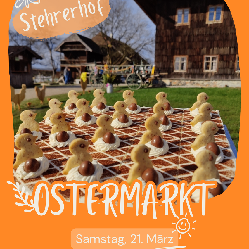 Ein festlicher Ostermarkt in Sterrenhof mit einer Reihe von schokoladenüberzogenen Keksenten auf einem braunen Gitter, mit Häusern und Grünpflanzen im Hintergrund.
