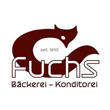 Das Logo der Fuchs Bäckerei und Konditorei, gegründet 1892, zeigt einen stilisierten roten Fuchs.