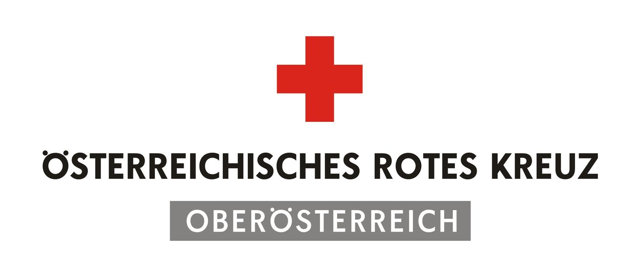 Das Logo des Roten Kreuzes in Oberösterreich mit dem Motto 'Mit Liebe zum Menschen'.