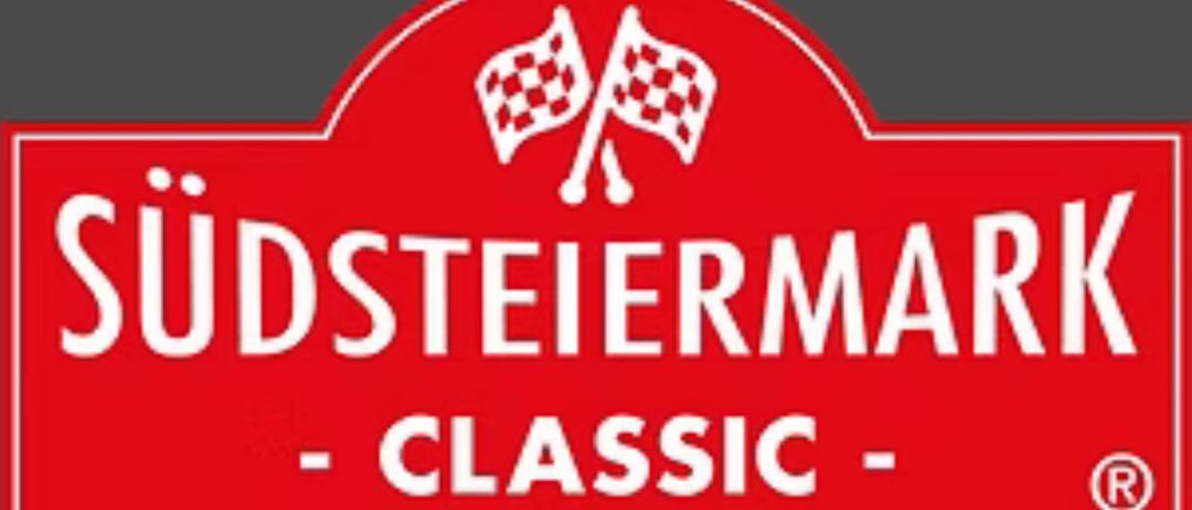 Ein rotes Schild mit weißem Text, das 'DSTEIERMAN - CLASSIC -' lautet. Über dem Text befinden sich zwei geflaggte Flaggen. Das Design ist fett und zentriert.