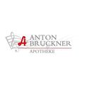 Logo für Anton Bruckner Apotheke mit einem Musiknotensymbol und dem Namen in Rot und Schwarz.