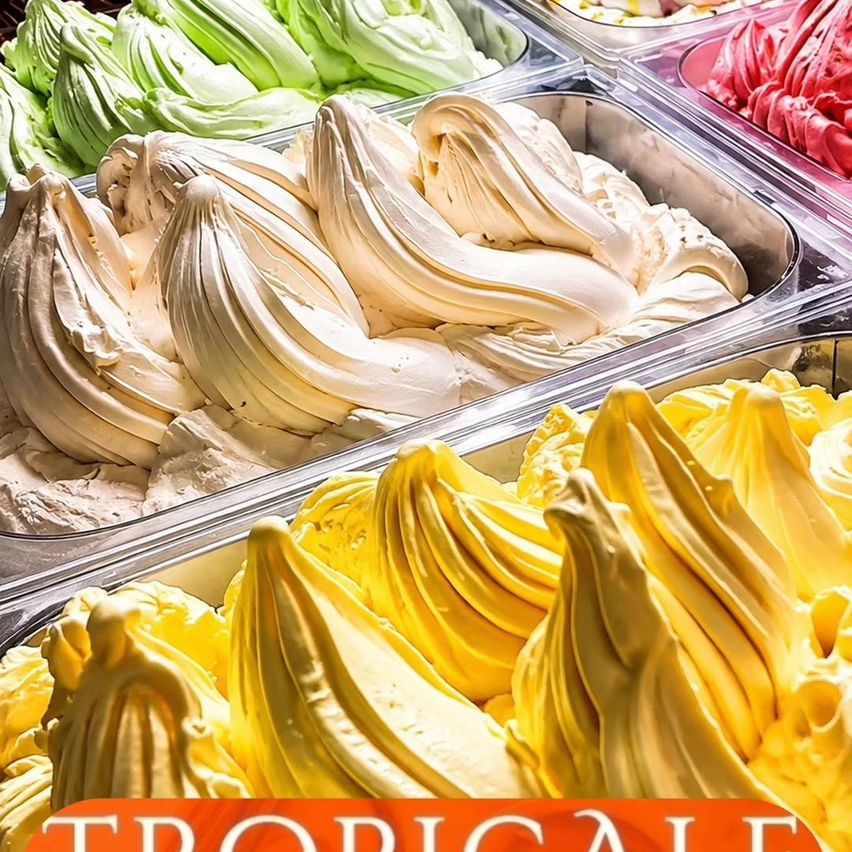 Ein Nahaufnahme von verschiedenen Eissorten in einer Vitrine, einschließlich weiß, gelb, grün und rot. Das gelbe Eis ist prominent zu sehen.