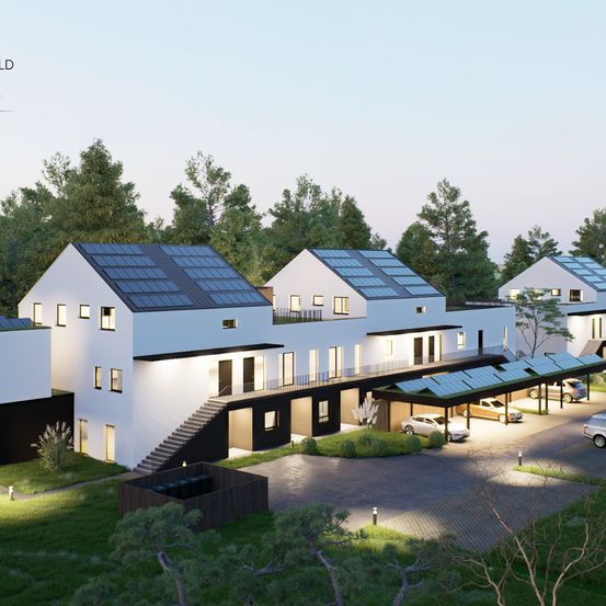 Eine Vogelperspektive auf moderne, mit Solarpanels ausgestattete Häuser in einer Vorstadtsiedlung.
