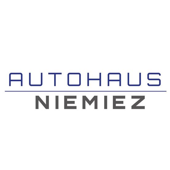 Das Logo von Autohaus Niemiez, mit dem Firmennamen in blauem und grauem Text auf weißem Hintergrund.