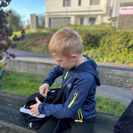 Person, Sitting, Coat, Jacket, Bench, Boy, Child, Male, Pants, Photography
