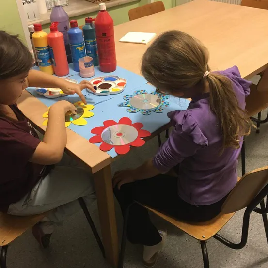Furniture, Table, Tabletop, Child, Female, Girl, Person, Student, Chair, Head