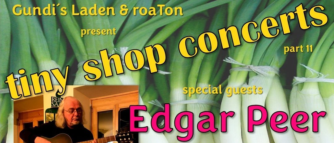 Plakat für ein Konzert von Edgar Pe, mit einem Mann, der Gitarre spielt, vor einem Hintergrund aus grünen Zwiebeln. Die Veranstaltung findet in Gundi's Laden in St. Radegund am 12.12.2025 ab 19 Uhr statt. Es werden spezielle Gäste angekündigt, und der Eintritt ist frei.