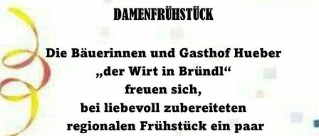 Ein farbenfrohes Plakat kündigt ein Frauentagsfrühstück bei Hueber Wirt in Brundl an und lädt Gäste ein, ein regionales Frühstück zu genießen und angenehme Stunden zu verbringen. Die Veranstaltung beginnt um 9:00 Uhr.