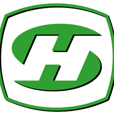 Ein grünes und weißes Schild-förmiges Logo mit einem geschwungenen Buchstaben 'H' in der Mitte, vor schwarzem Hintergrund.