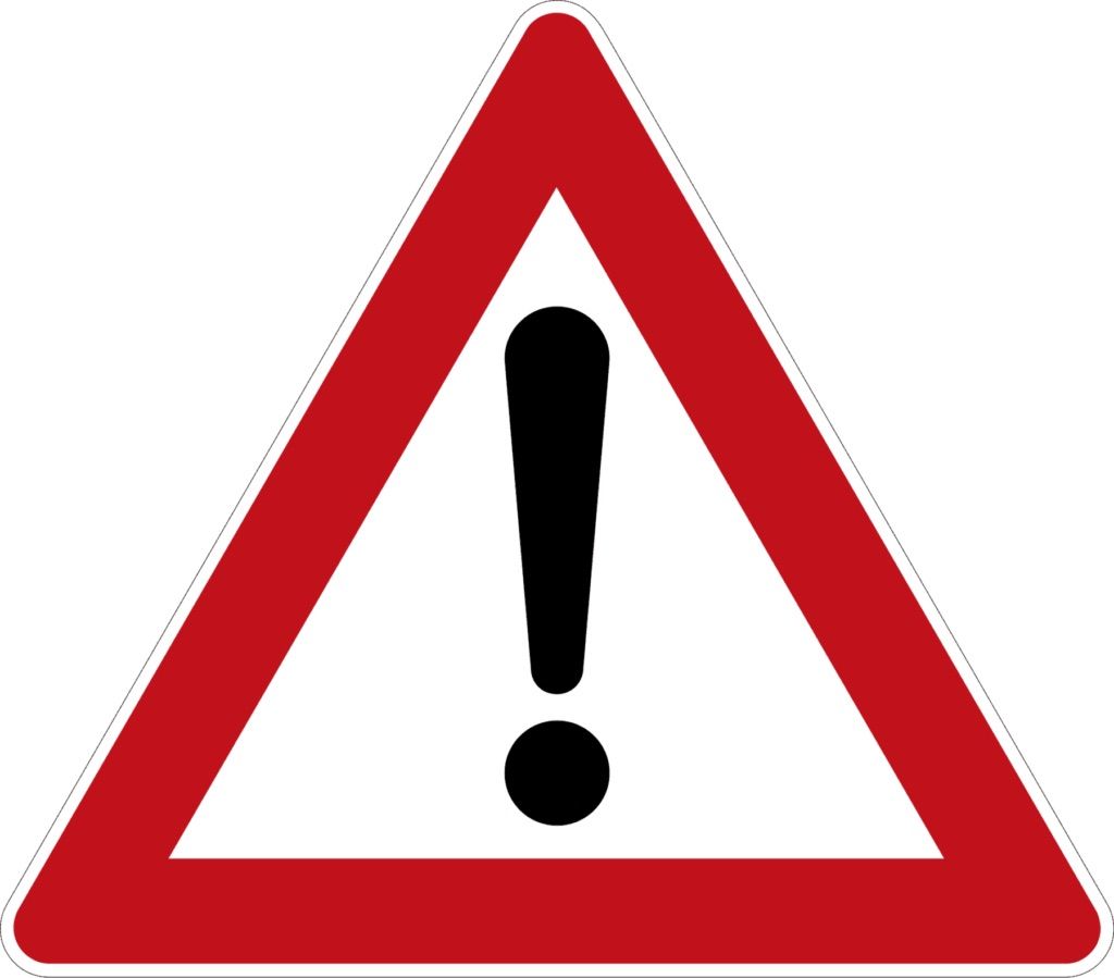 Ein rotes Dreieck mit einem weißen Ausrufezeichen darin, umgeben von einem roten Rand.