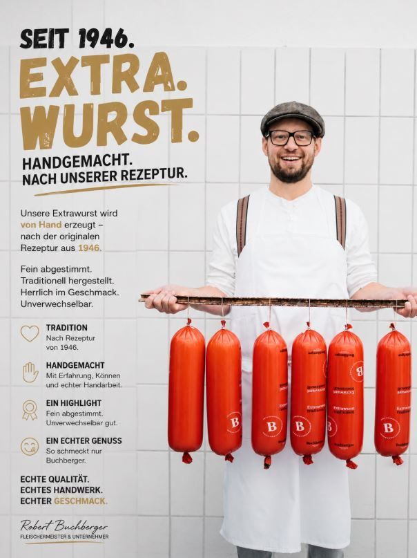 A man in a butcher's uniform holds a row of sausages labeled 'Extra Wurst'. The image highlights the brand's tradition, handmade quality, and unique taste. The background features a tiled wall and the brand's logo.