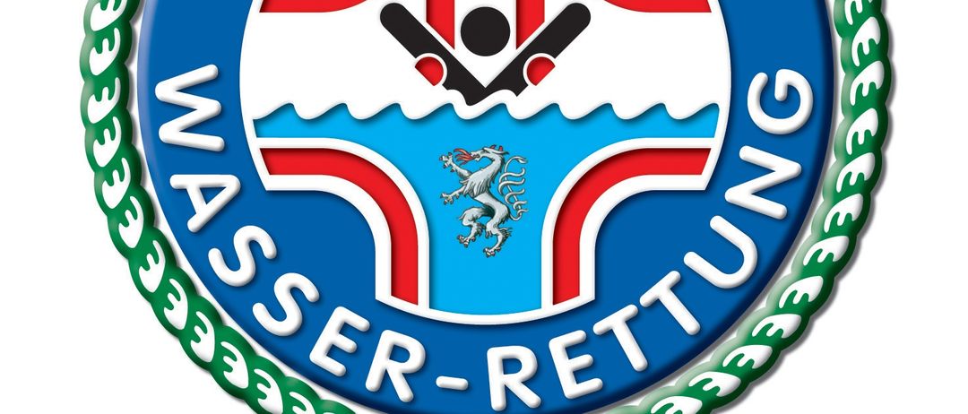 Das Logo der Steirischen Wasser-Rettung zeigt ein Kreuz mit einem Schwimmer, einem Drachen und weißem Text auf blauem Hintergrund.