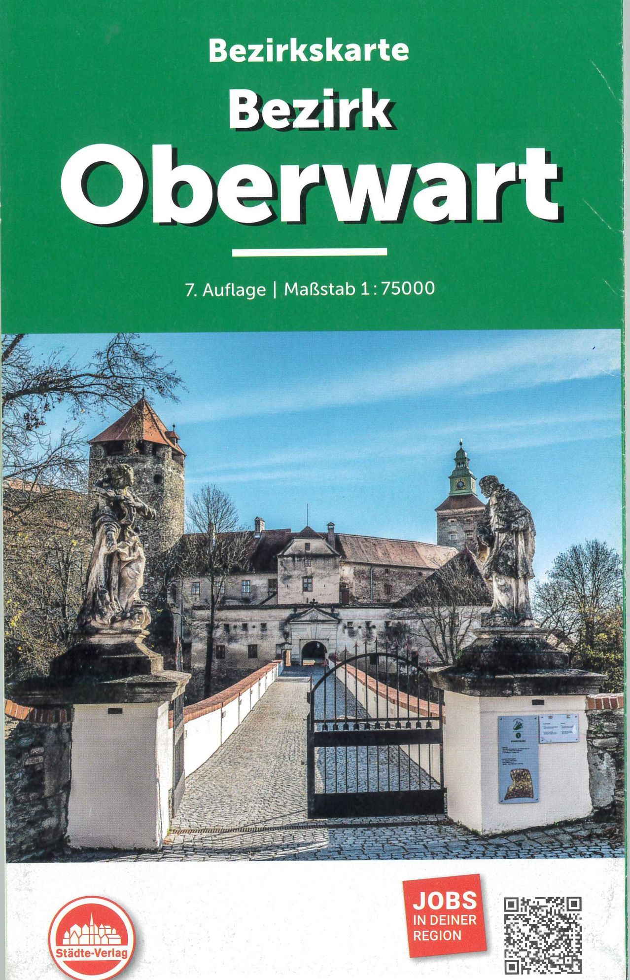 Ein Kartencover, das eine Burg namens Oberwart mit einem Maßstab von 1:75000 und der 7. Auflage zeigt. Zwei Statuen befinden sich auf beiden Seiten des Eingangstores.