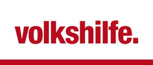 Das Wort 'Volkshilfe' ist in fetter, roter, serifenloser Schrift geschrieben. Es erscheint auf weißem Hintergrund mit einem roten Rand unten.