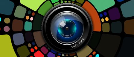 An artistic representation of a camera lens with a vibrant, multicolored mosaic background, showcasing various shades of blue, green, yellow, and more. The lens is labeled 'Lens Zoom'.