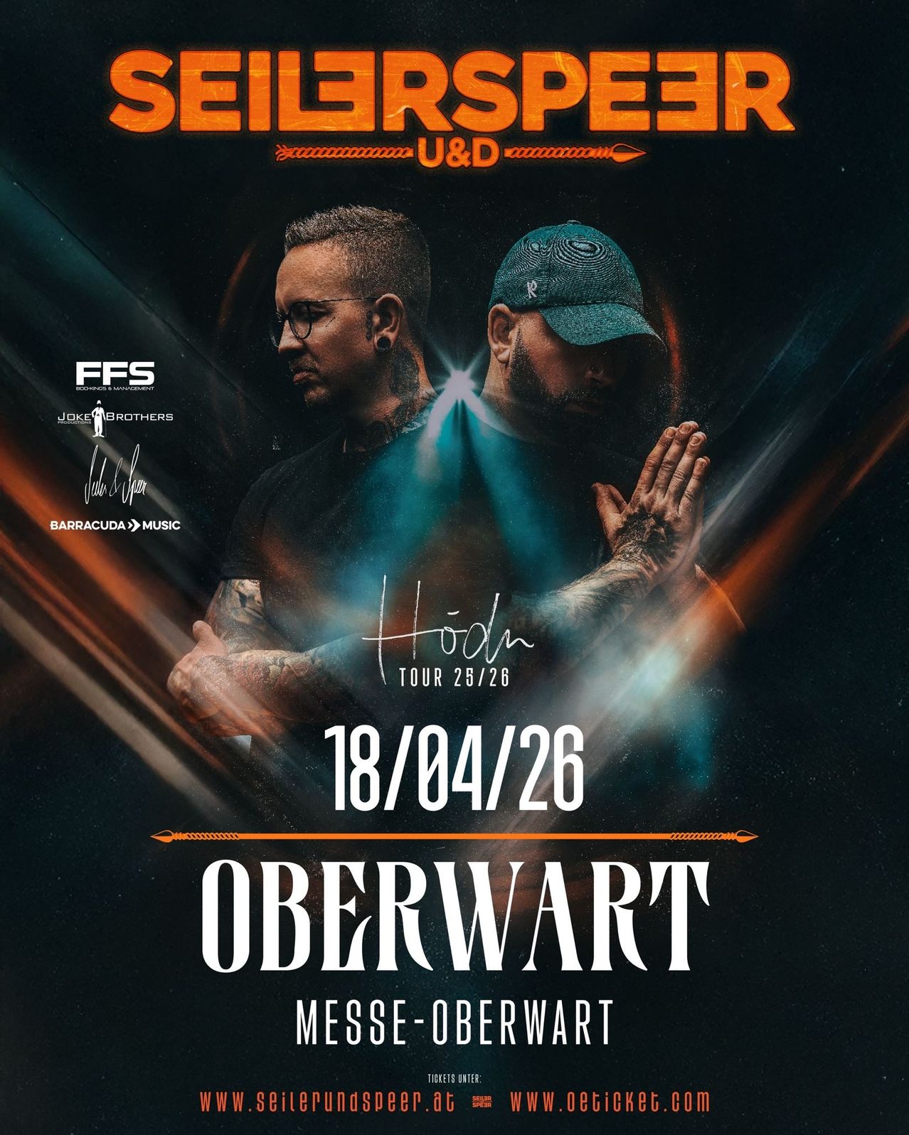 Plakat für die Hodn-Tour 2026 mit zwei Männern, einer mit Brille und Baseball-Cap, der andere mit Tattoos an den Armen. Das Datum 18/04/26 ist prominent angezeigt.