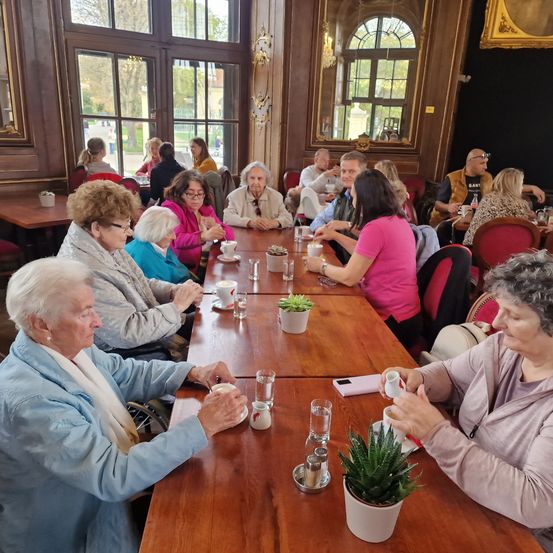 Image contains, Restaurant, Food Court, Wood, Adult, Female, Person, Woman, Male, Man, Dining Table