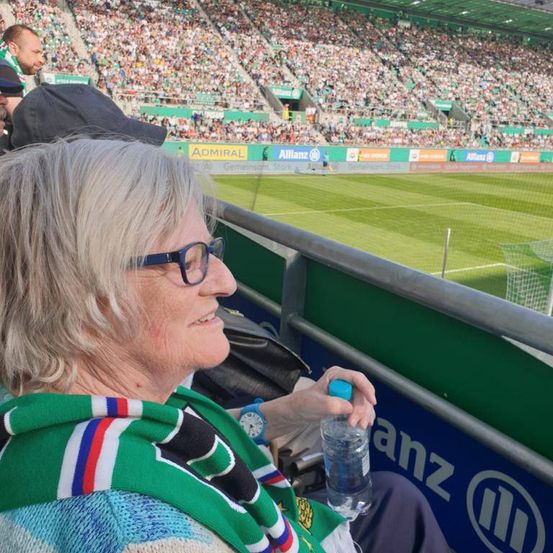 Image contains, Adult, Female, Person, Woman, Accessories, Glasses, Face, Head, Building, Stadium